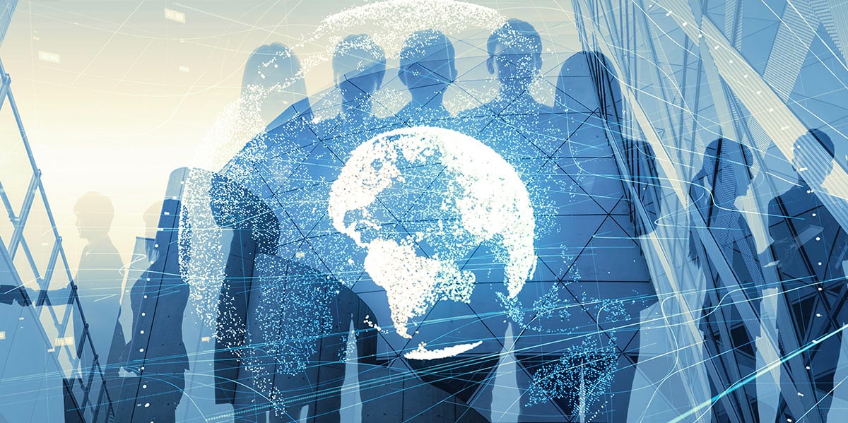 silhouette of a group of business people with a digitized globe overlay in front of them
